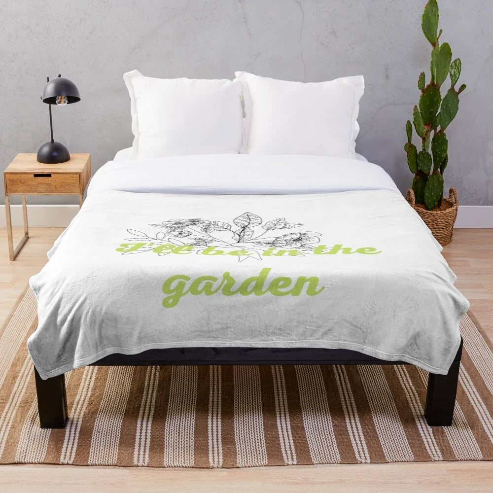 Plush blanket featuring a garden-themed design for hobby enthusiasts