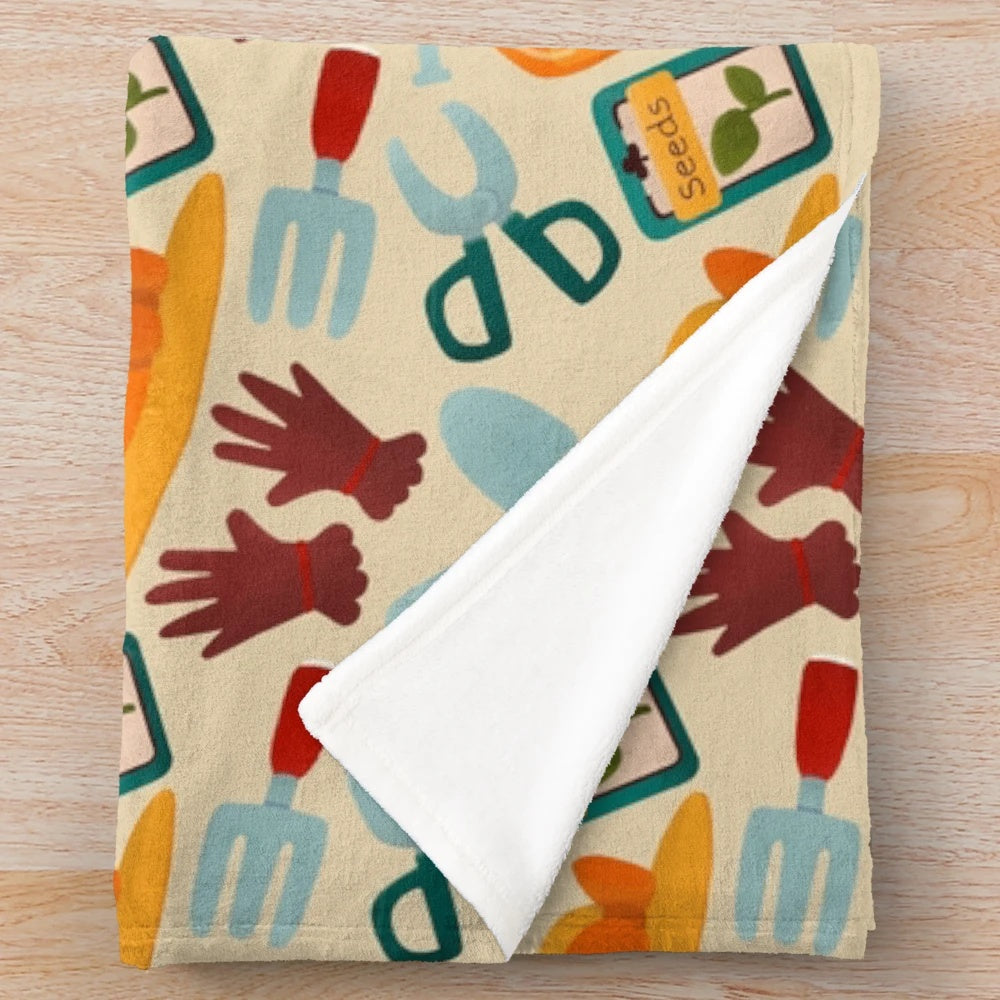 Soft and cozy plush blanket featuring a playful garden-themed design