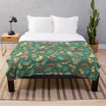 Vibrant green plush blanket featuring a family of geckos
