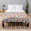 Gecko-patterned plush blanket