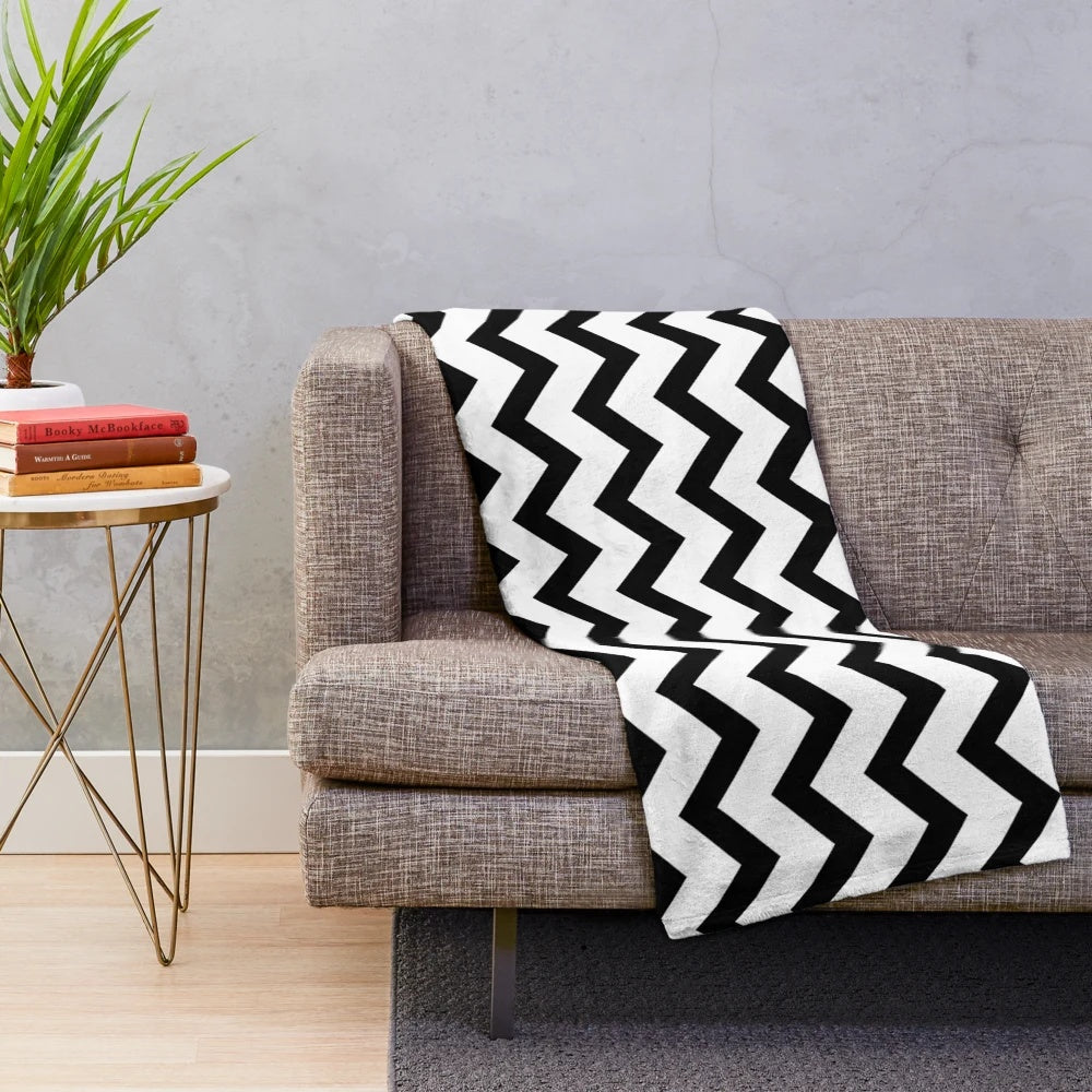 Black and white geometric chevron pattern plush blanket for home decor