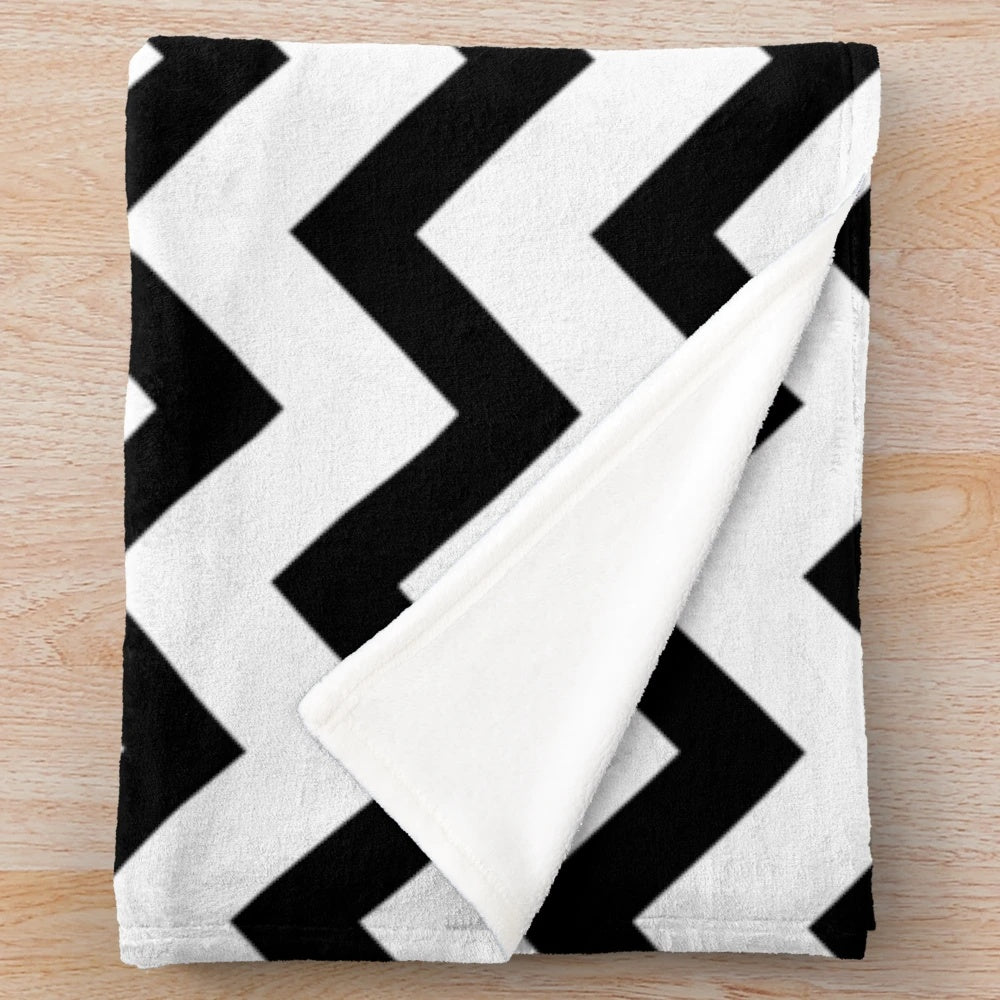 Black and white geometric chevron pattern plush blanket for home decor