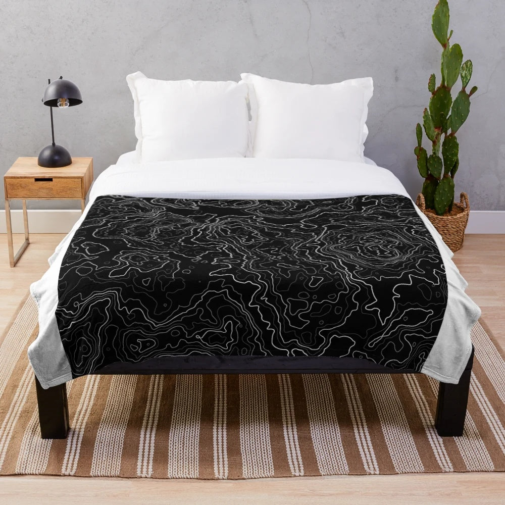 Geometric abstract plush blanket with mountain landscape design