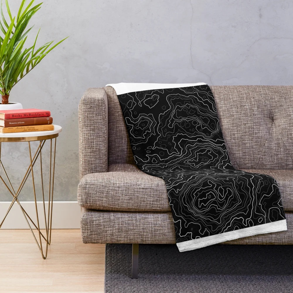 Geometric abstract plush blanket with mountain landscape design
