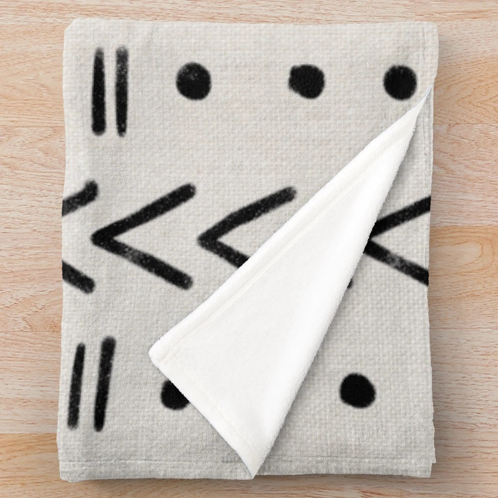 Mudcloth inspired black and white geometric plush blanket