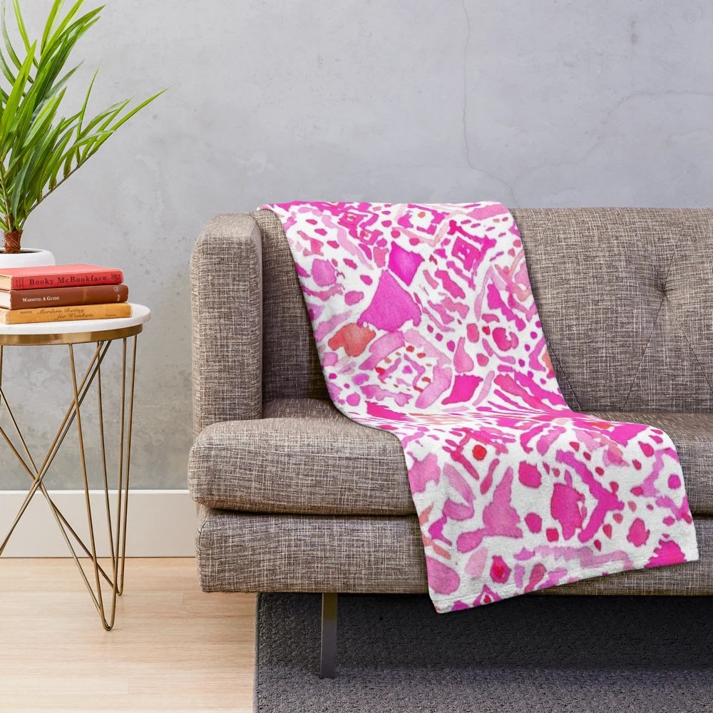 Soft and cozy plush blanket with a stylish geometric pattern