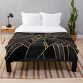 Black and copper geometric pattern plush blanket
