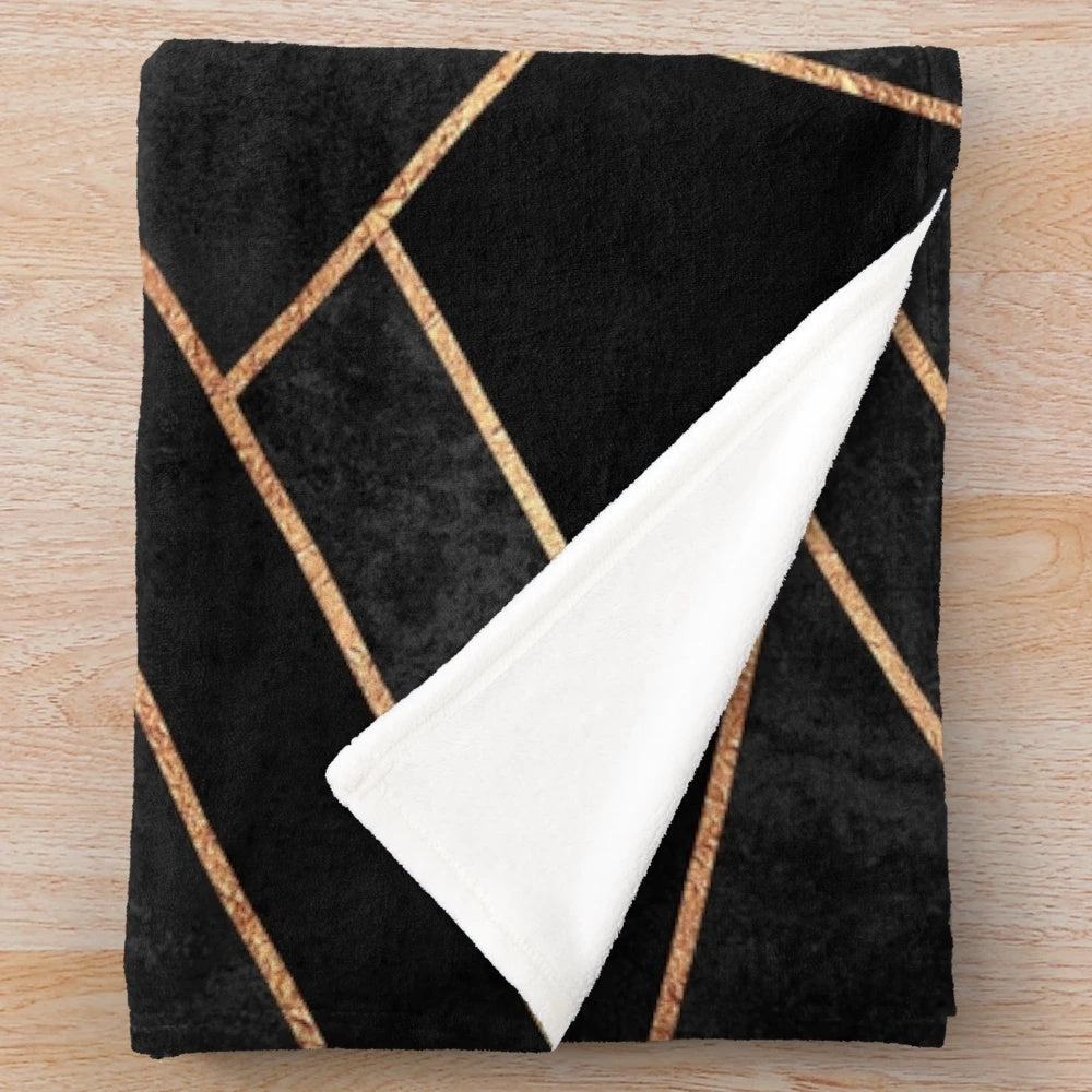 Black and copper geometric pattern plush blanket