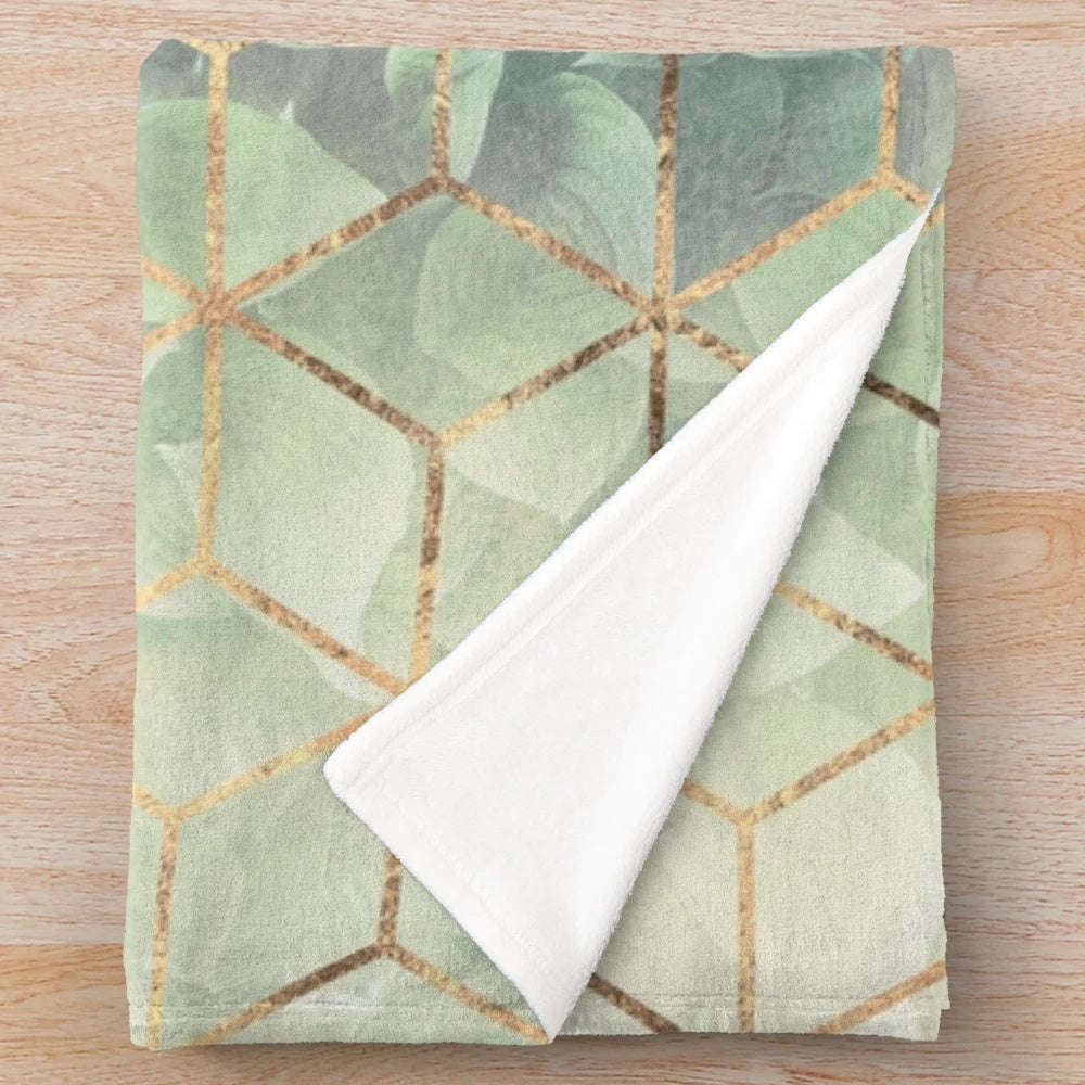 Cozy plush blanket with abstract geometric leaf pattern