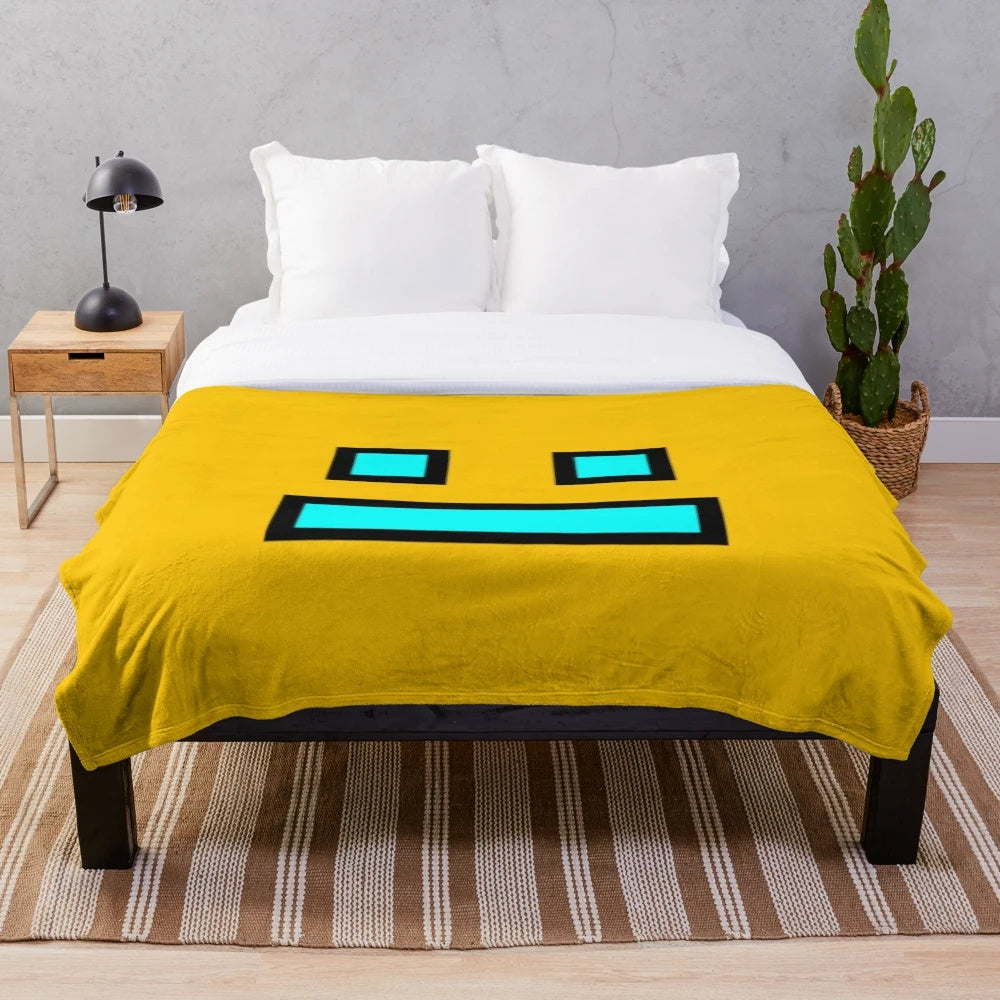Geometry Dash themed plush blanket with geometric patterns