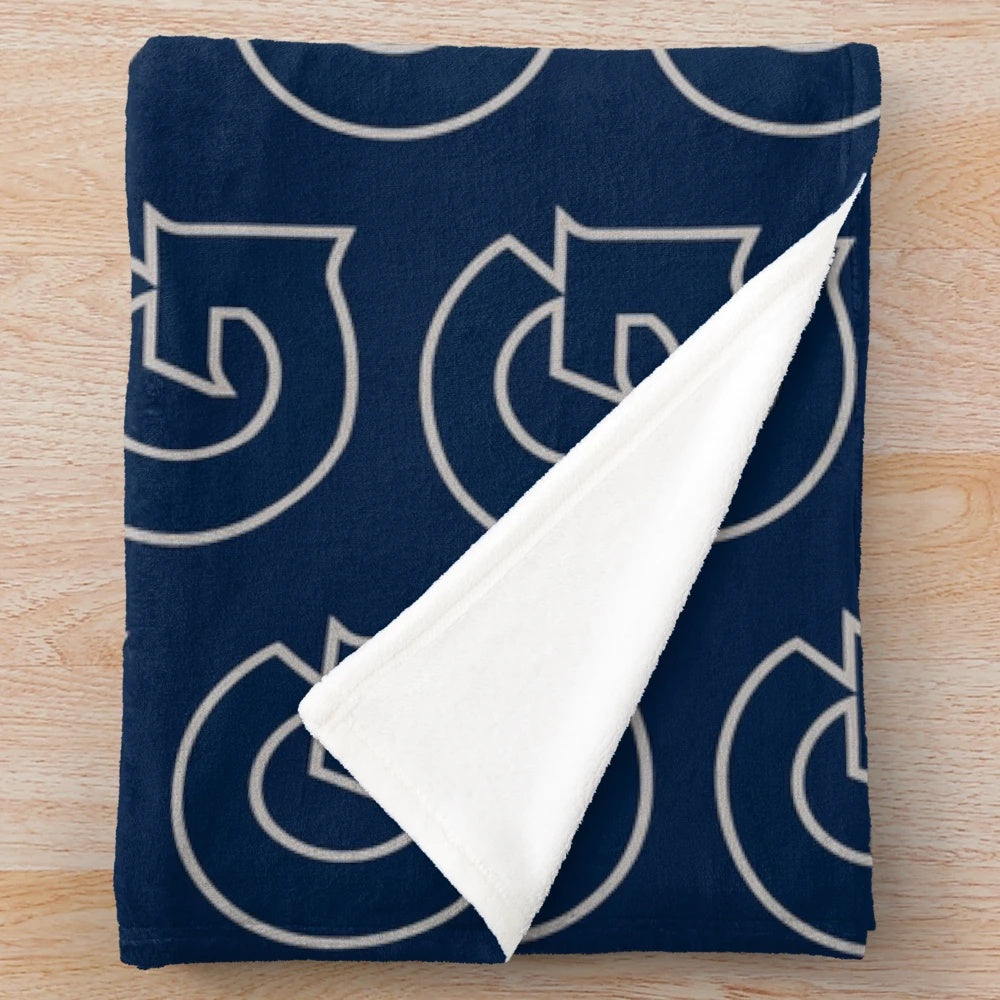 Georgetown Hoyas plush blanket featuring the team's logo and colors