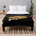 Plush blanket depicting a dog lying in an inconvenient way, inspired by the popular German comedy series Loriot