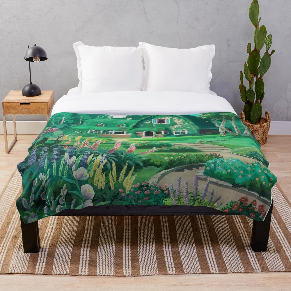 Plush blanket featuring the iconic Ghibli House from Studio Ghibli's beloved anime films