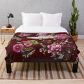 Colorful floral plush blanket with ghostly pattern