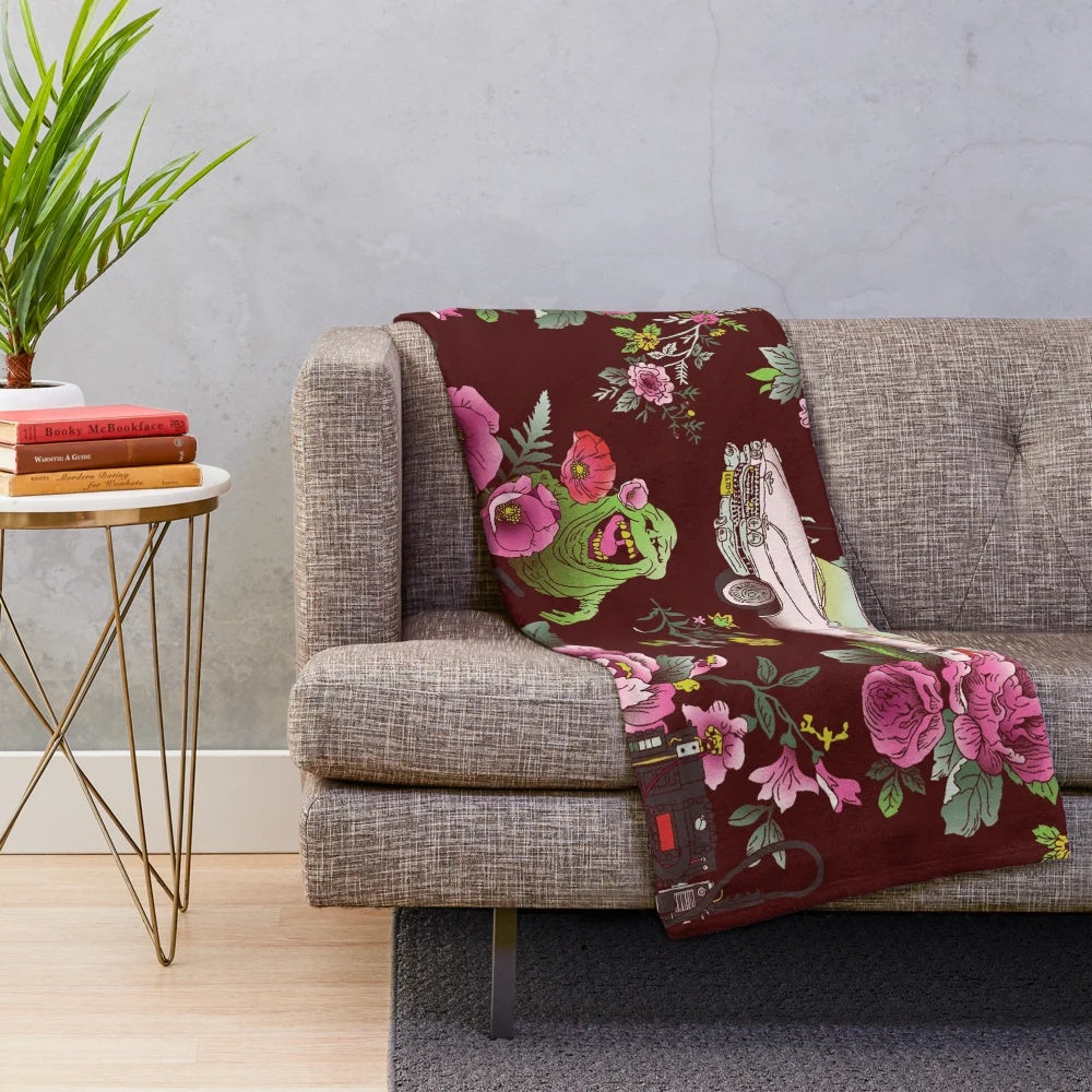 Colorful floral plush blanket with ghostly pattern