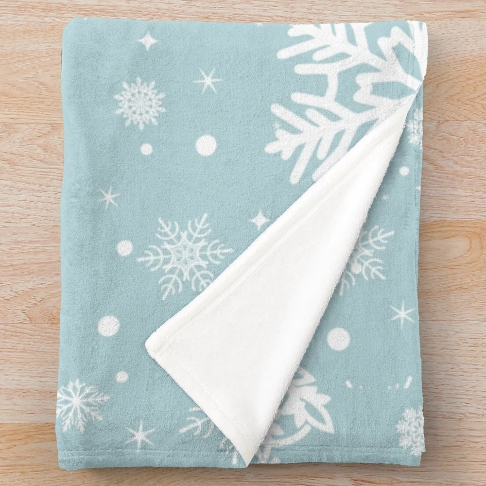 Plush blanket with a snowflake design, inspired by the TV show Gilmore Girls