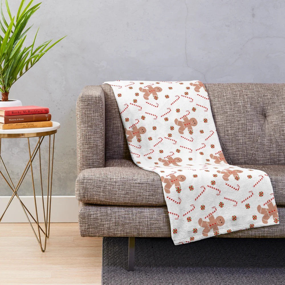 Gingerbread man plush blanket with festive Christmas candy design