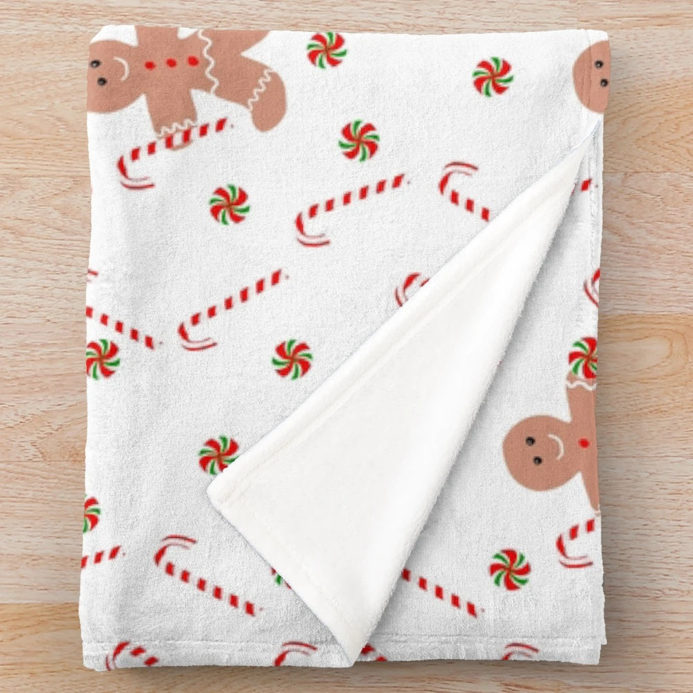 Gingerbread man plush blanket with festive Christmas candy design