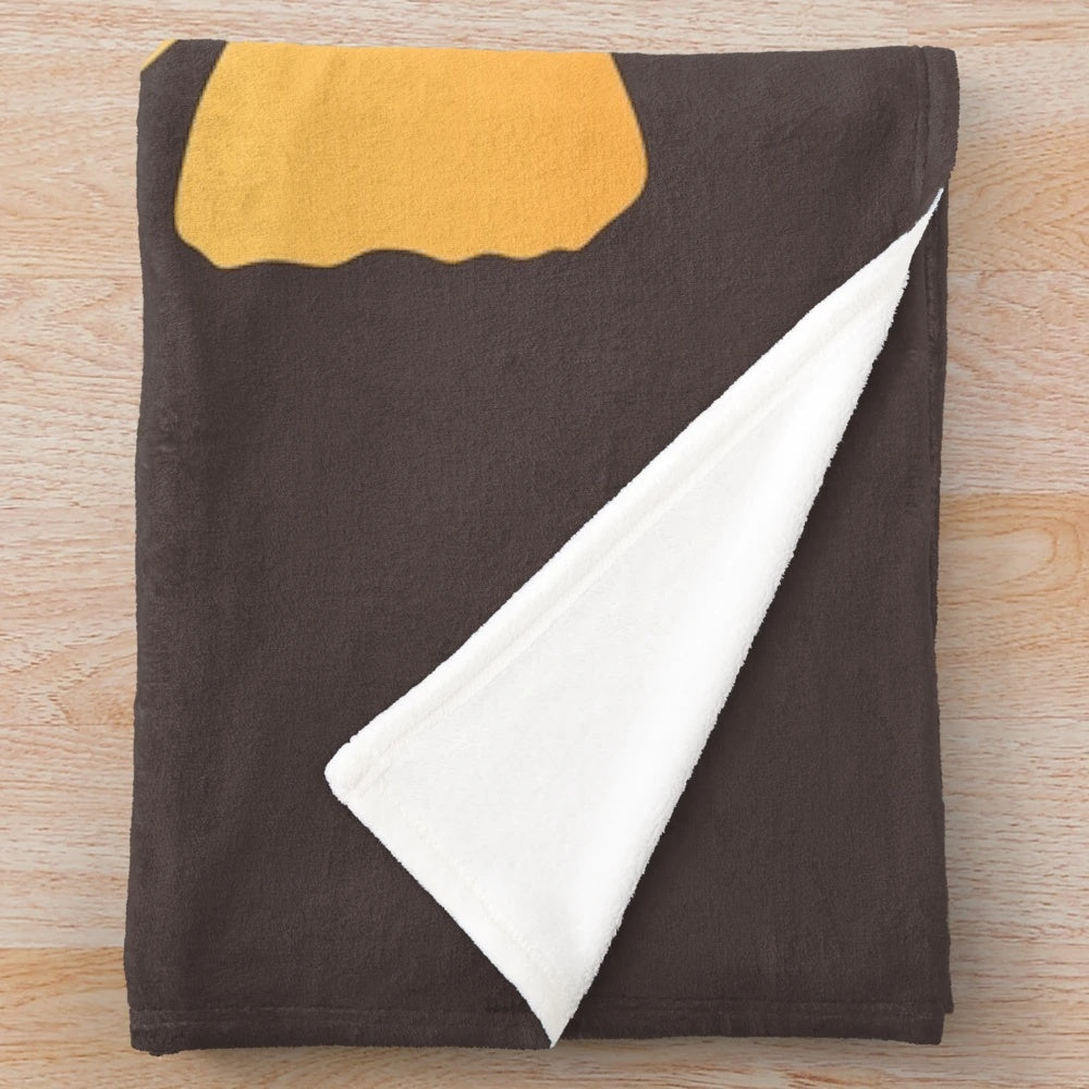 Ginkgo leaves plush blanket in shades of yellow, green, and brown