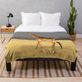 Giraffe plush blanket with spotted design, perfect for cozy home decor