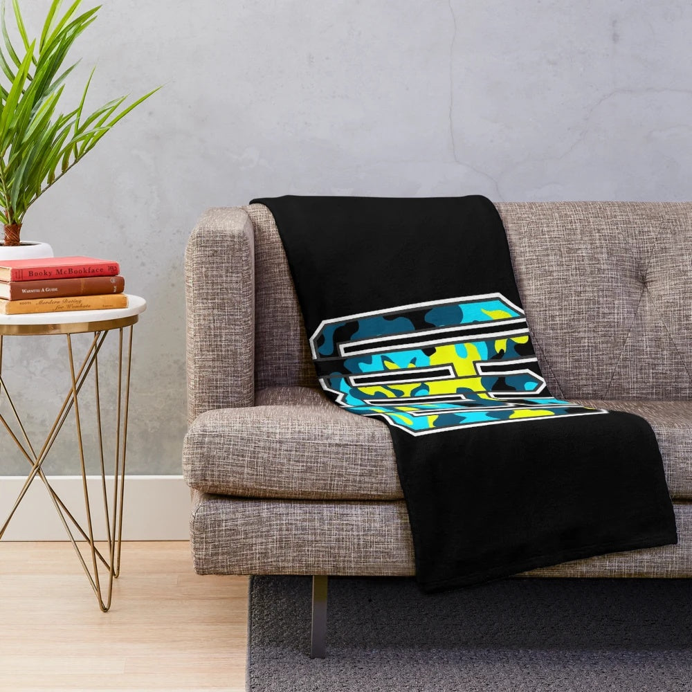 Soft and glowing plush blanket featuring the Raymond Warner design