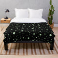 Glow stars plush blanket for a cozy, celestial ambiance