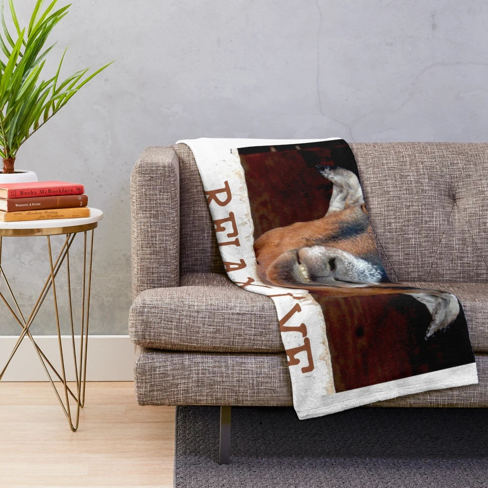 Soft and plush goat-themed blanket with a smiling goat face