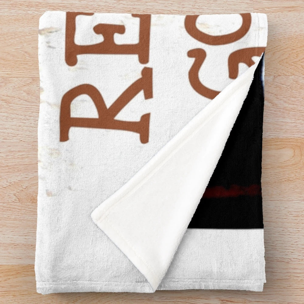 Soft and plush goat-themed blanket with a smiling goat face