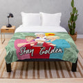 Golden Girls-themed plush blanket featuring Blanche, Dorothy, Rose, and Sophia