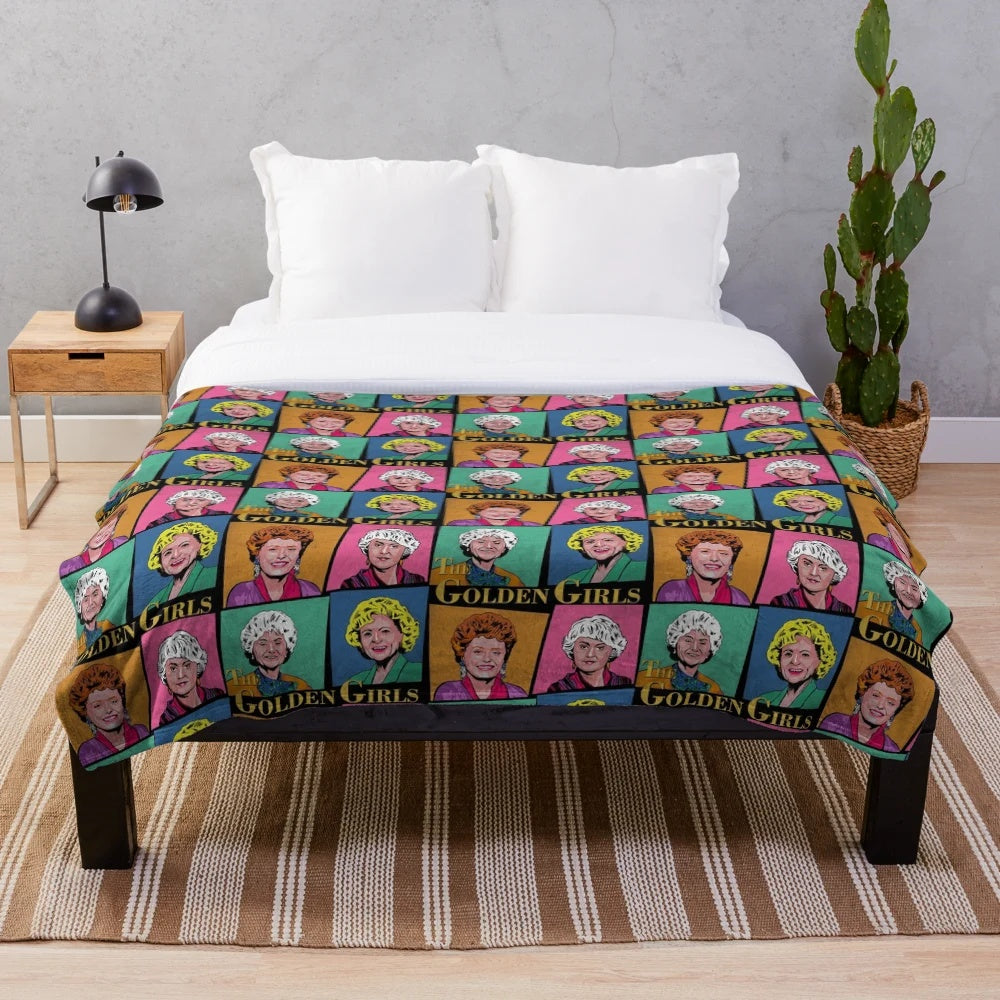 Golden Girls inspired plush blanket featuring the iconic characters Blanche, Dorothy, Rose, and Sophia