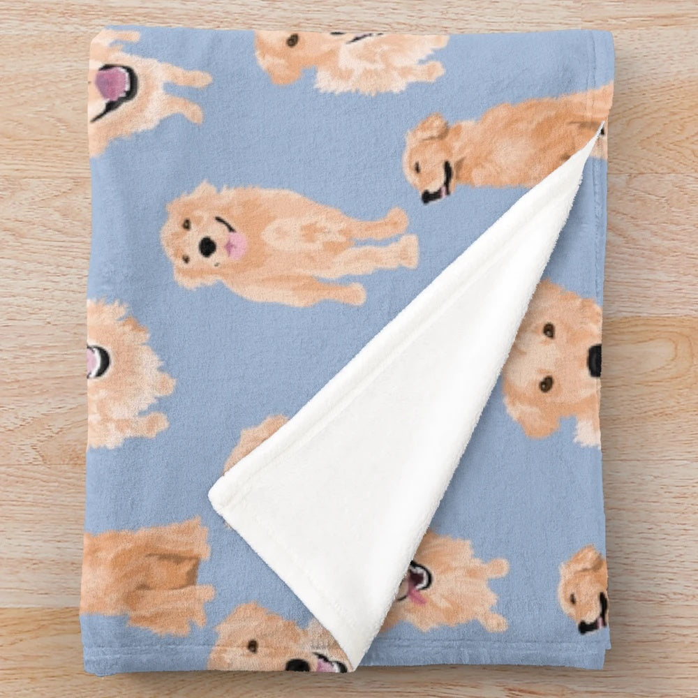 Golden retriever dog lying on a soft, blue plush blanket