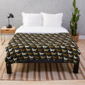 Golden Retriever dog breed silhouette on a plush blanket