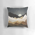A luxurious throw pillow featuring a serene landscape with glowing golden stars against a night sky