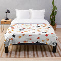 Plush goldfish themed blanket with a collage of different fancy goldfish breeds