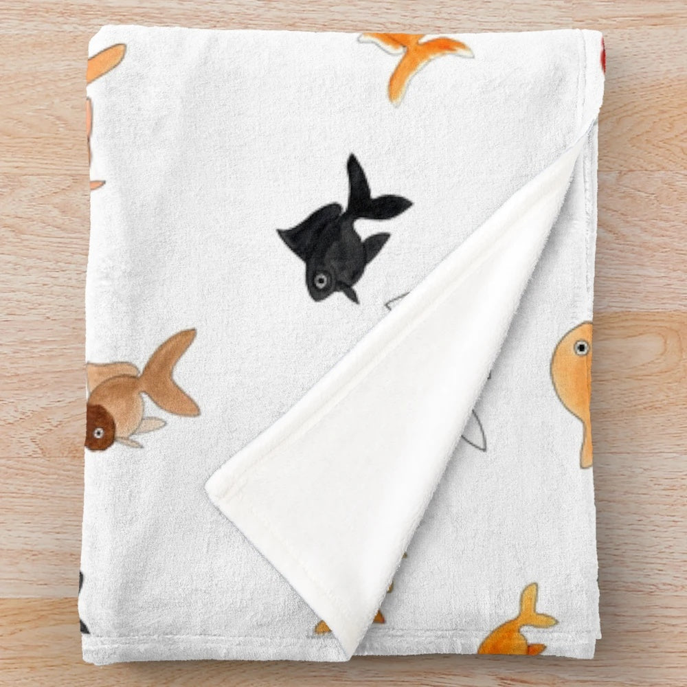 Plush goldfish themed blanket with a collage of different fancy goldfish breeds