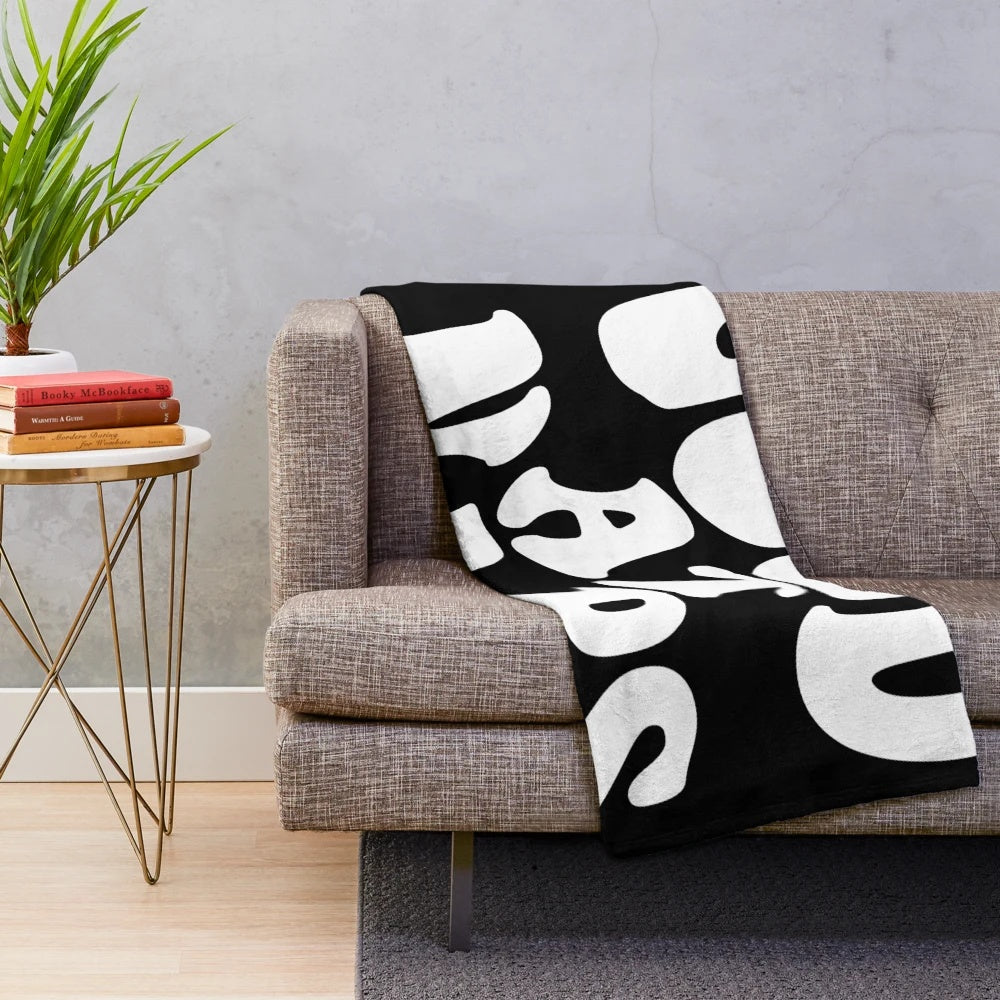 Soft and plush "Good At Naps" blanket perfect for napping