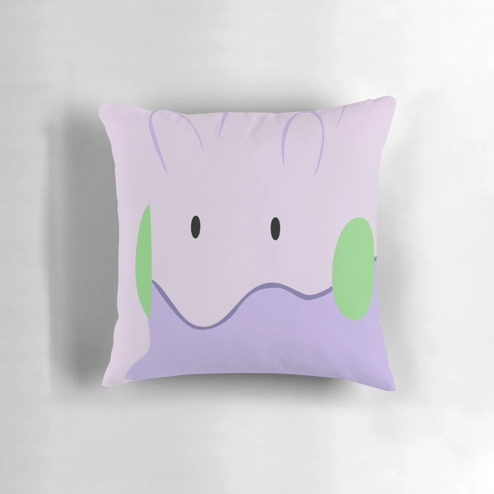 Soft and plush Goomy Pokemon pillow with vibrant colors and detailed design.