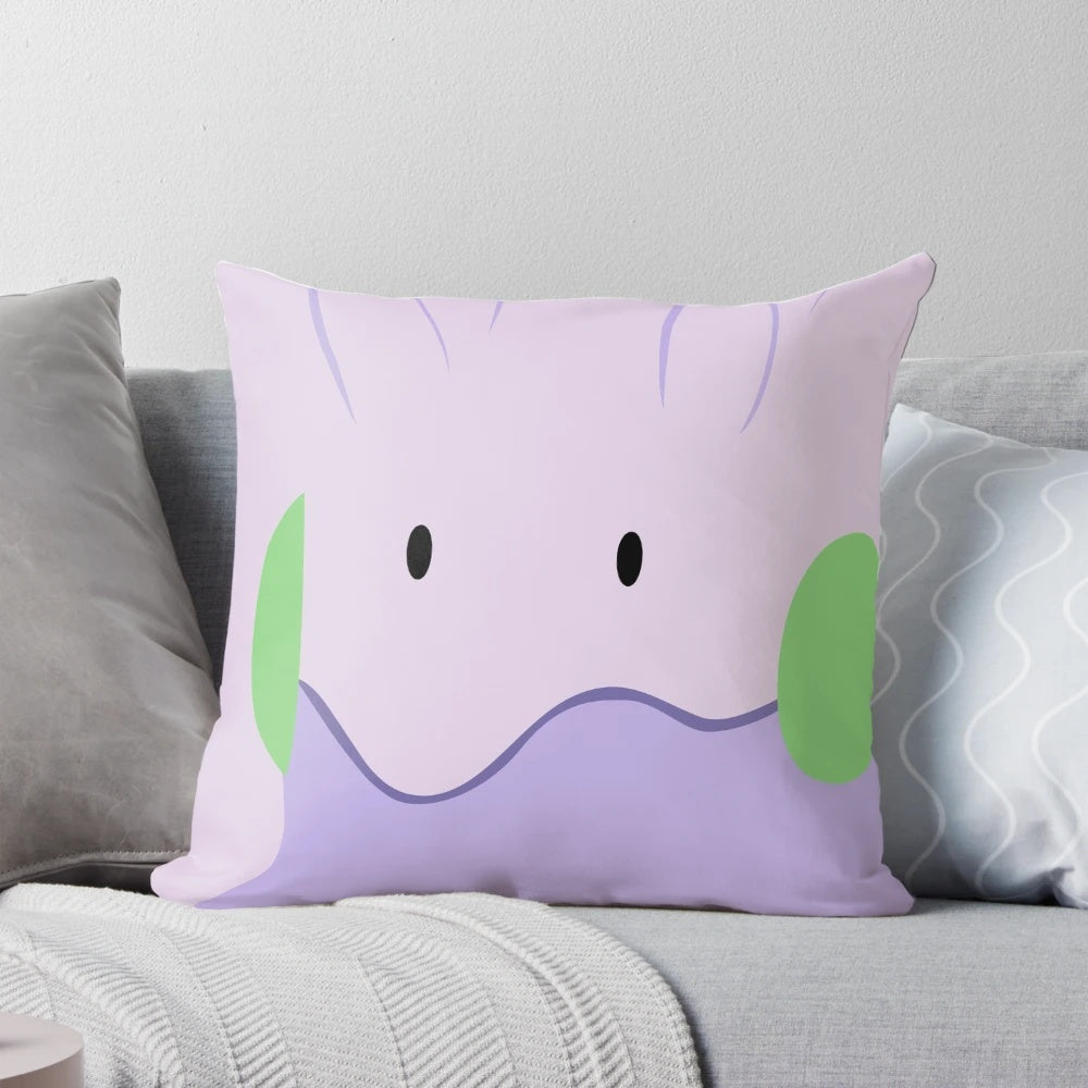Soft and plush Goomy Pokemon pillow with vibrant colors and detailed design.
