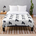Closeup of a soft and cuddly gorilla plush blanket