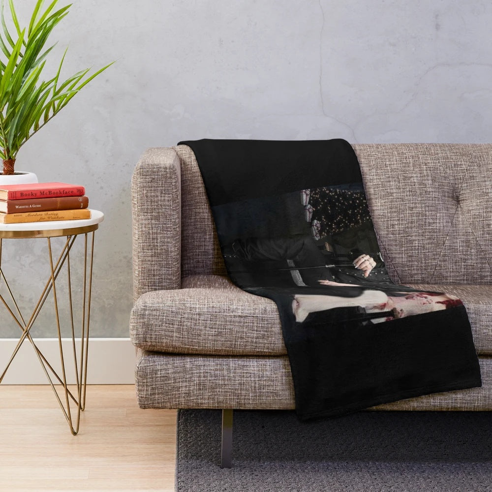 Soft, plush blanket with a gothic, anime-inspired design
