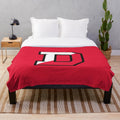 Big red plush blanket featuring the Granville Denison logo