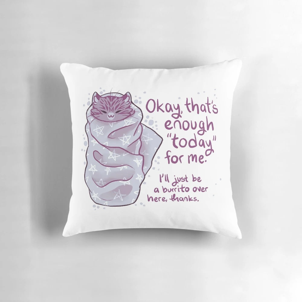 Soft, gray plush pillow in the shape of a cat burrito or "purrito" for comfort and self-care.