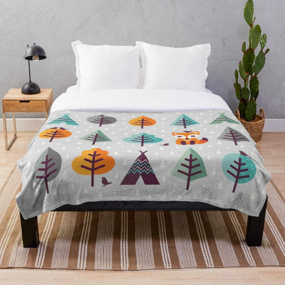 Gray plush blanket with a cute cartoon fox in the forest design
