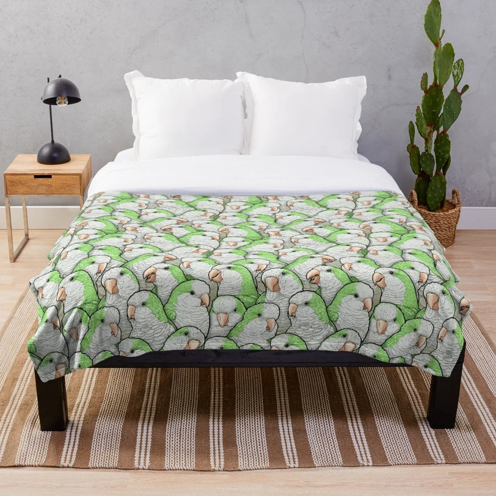 Green plush blanket with cute quaker parakeet design