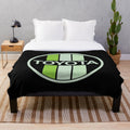 Green Toyota-inspired plush blanket with circular patterns