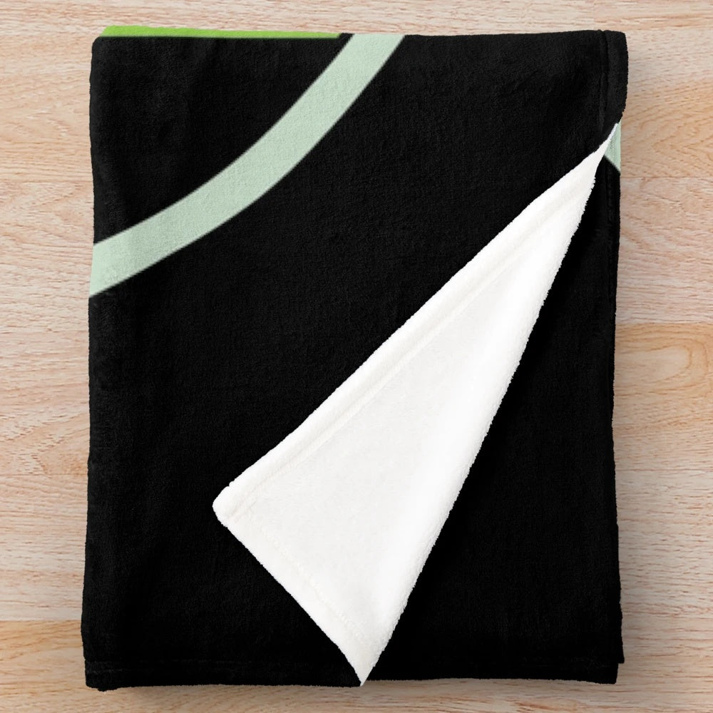 Green Toyota-inspired plush blanket with circular patterns