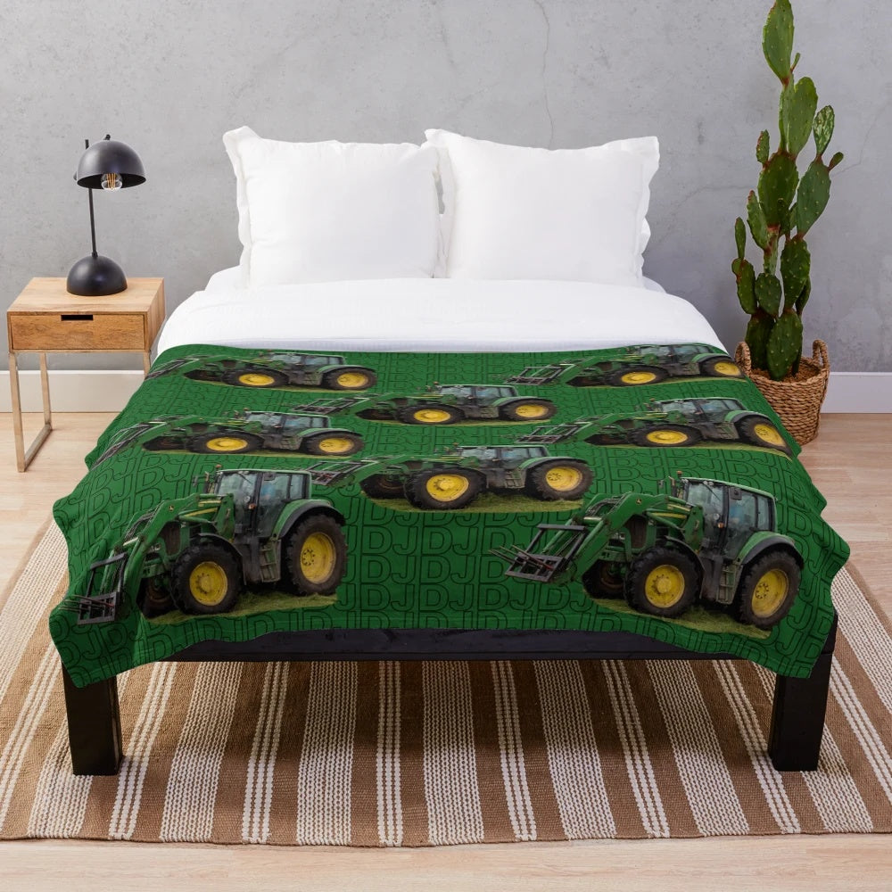 Green tractor plush blanket with farm details