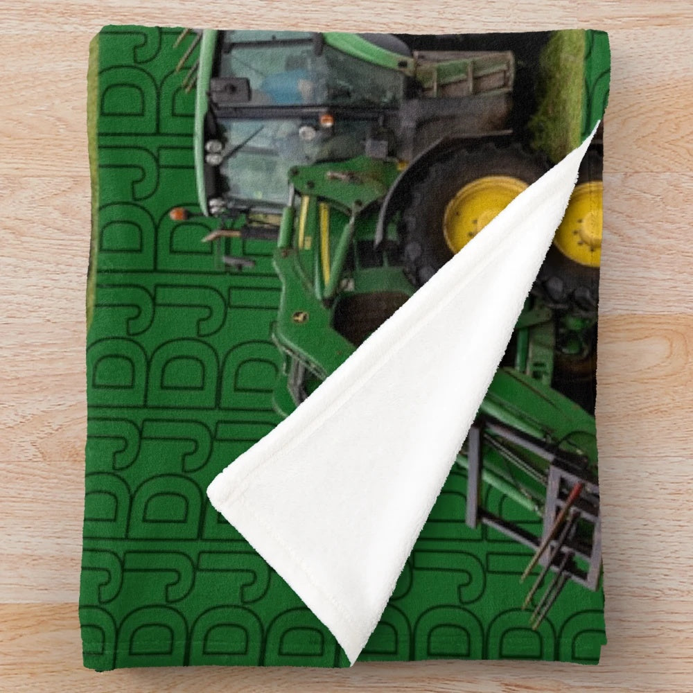 Green tractor plush blanket with farm details