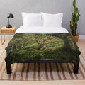 Green tree plush blanket with nature landscape