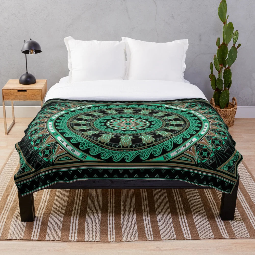 Soft green turtle plush blanket with tribal and ocean-themed graphics